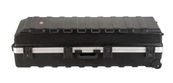 A black case with white lining and handles.
