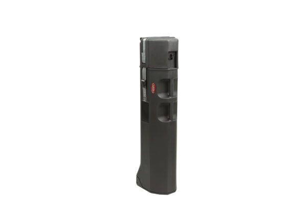 A black and red plastic object is standing up