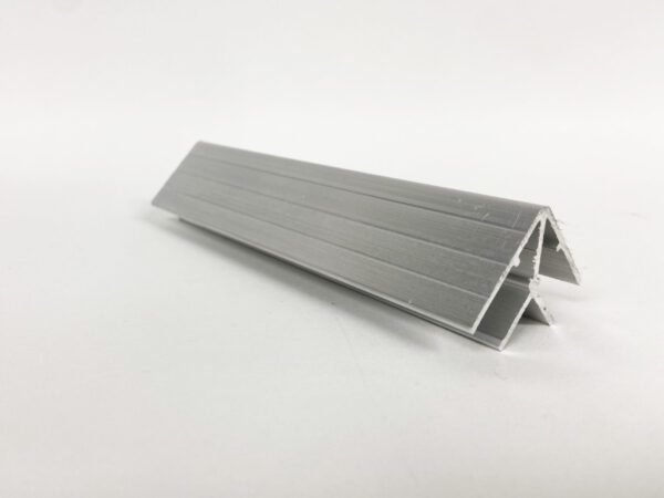 A close up of the corner of a piece of aluminum