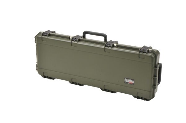 A green case with two handles and one handle missing.