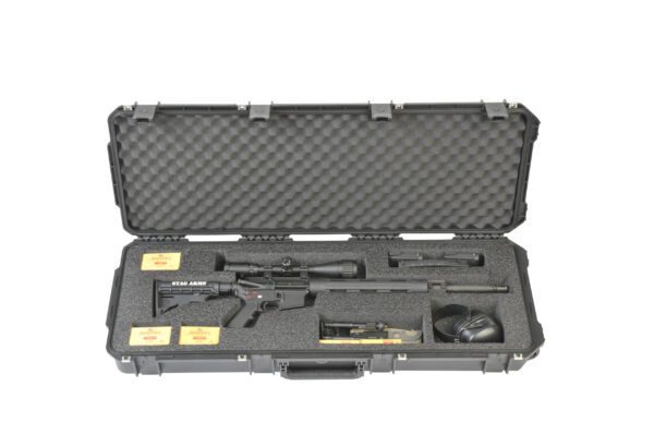 A rifle case with two guns and accessories.