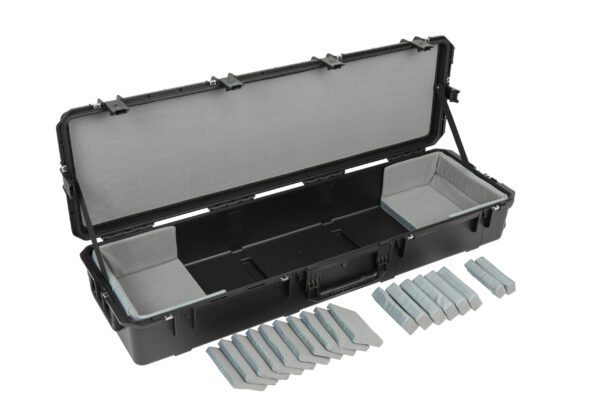 A black case with two compartments and many dividers.
