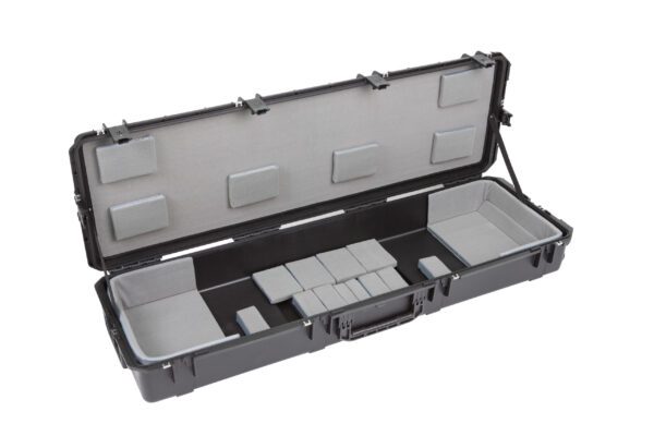 A black case with many compartments inside of it