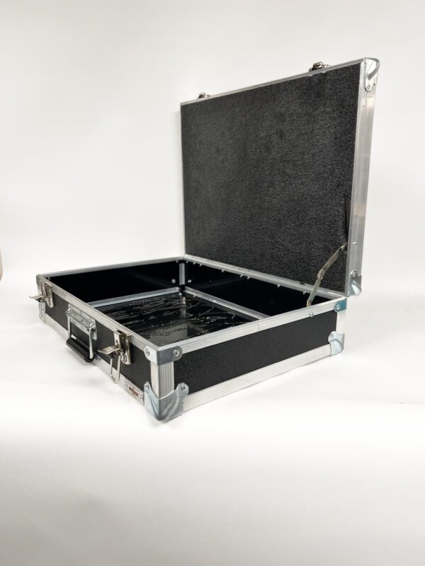 A black case with a silver handle and two compartments.