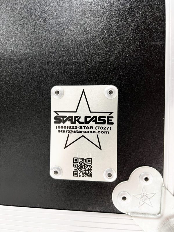 A metal plaque with the name of a star.